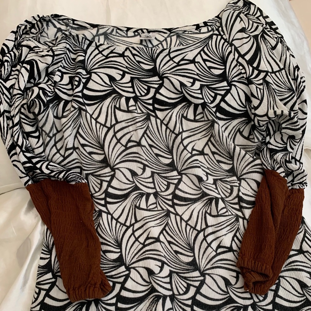 Boho chic long sleeve white, black and brown top.